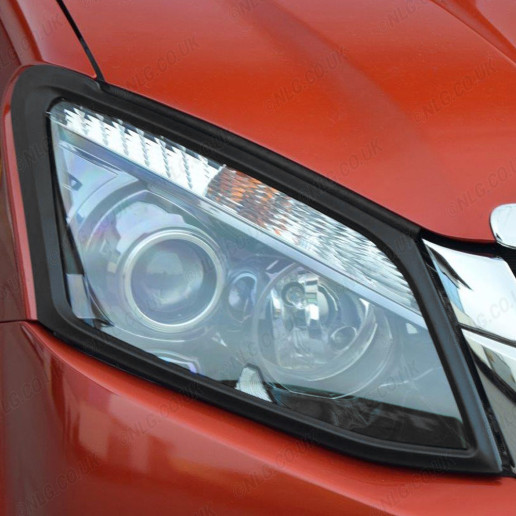 Black headlamp surround fitted to an Isuzu D-Max 2012-2017