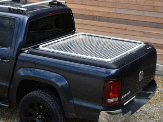 ISUZU D-MAX DOUBLE CAB ALUMINIUM CHEQUER PLATE MOUNTAIN TOP TONNEAU COVER Features  High Security lid Specific to Nissan Navara Robust Chequer plate finish Fully Lockable Non-Drill fit European quality construction Manufactured in Denmark Removed easily i