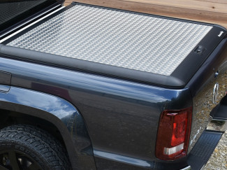 ISUZU D-MAX DOUBLE CAB ALUMINIUM CHEQUER PLATE MOUNTAIN TOP TONNEAU COVER Features  High Security lid Specific to Nissan Navara Robust Chequer plate finish Fully Lockable Non-Drill fit European quality construction Manufactured in Denmark Removed easily i