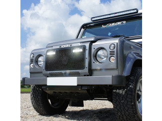 Lazer Lamps fitted to grille surround for Land Rover Defender