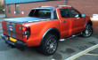 Ford Ranger Wildtrak fitted with a black leatherette soft roll truck top cover