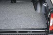 Close-up view of the BedRug Carpet Bed Mat