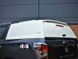 Blank sided commercial hard top fitted to a SsangYong Musso