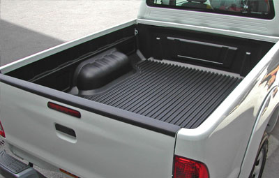 Under rail bed liner on a single cab pickup truck